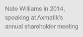 caption: Nate Williams in 2014, speaking at Axmatik's annual shareholder meeting.